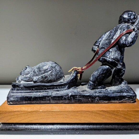 Vintage Inuit-Style Hunter Pulling Sled with Bear Cub - Picture 1 of 6